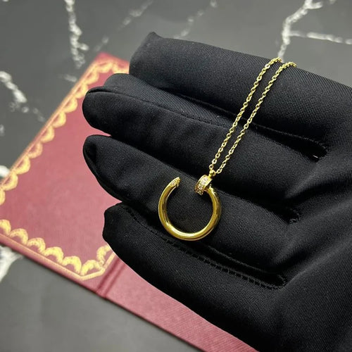 Gold Harmony – Sculptural Open Loop Necklace with Crystal Detail