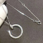 Infinite Grace in White Gold – Artistic Open Circle Necklace with Crystal Touch