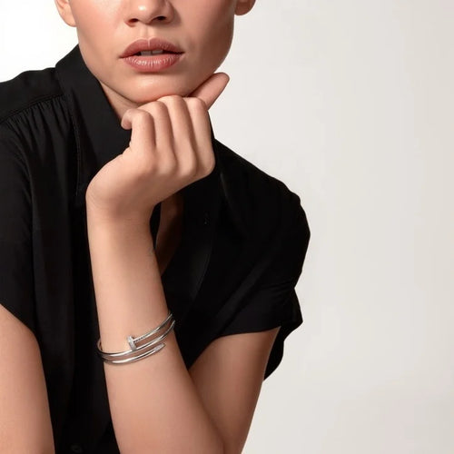 Elegant White Gold Nail-Inspired Bangle with Premium platinum