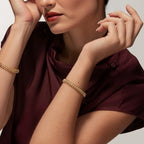 Shimmer Gold Pyramid Bangle with Geometric Detailing, Medium model