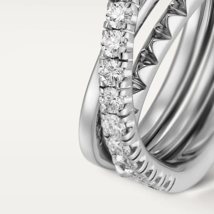 White Gold Spiral Of Daring Elegance – Intertwined Ring With Spiked And Shimmering Bands