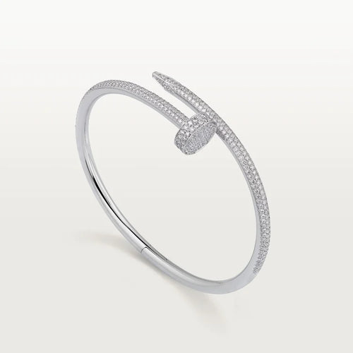 Elegant White Gold Nail-Inspired Bangle and Merging high fashion with primal instincts, classic model