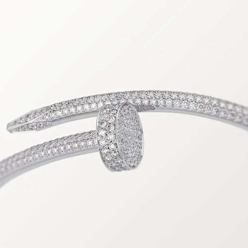 Elegant White Gold Nail-Inspired Bangle and Merging high fashion with primal instincts, classic model