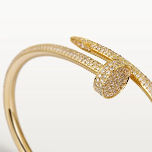 Elegant Gold Nail-Inspired Bangle and Merging high fashion with primal instincts, classic model