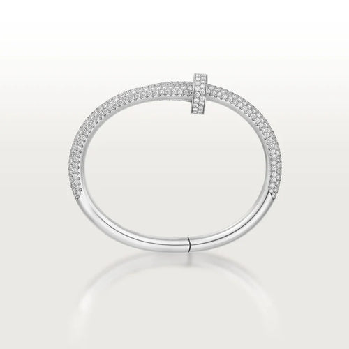 Elegant White Gold Nail-Inspired Bangle and Merging high fashion with primal instincts, large model