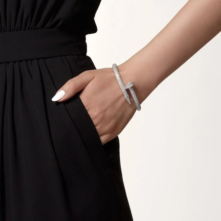 Elegant White Gold Nail-Inspired Bangle and Merging high fashion with primal instincts, large model