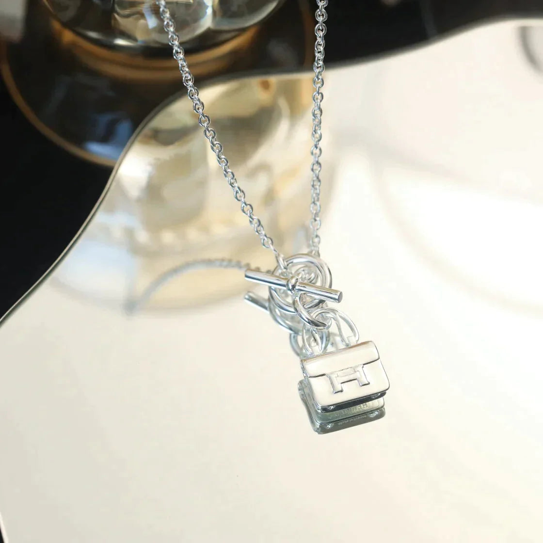 Pop H Pendant Necklace Silver Bag Charm Minimalist Luxury Design